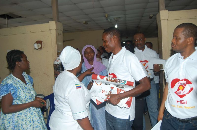 Nurse discussing with HEI memebrs at the Hospital