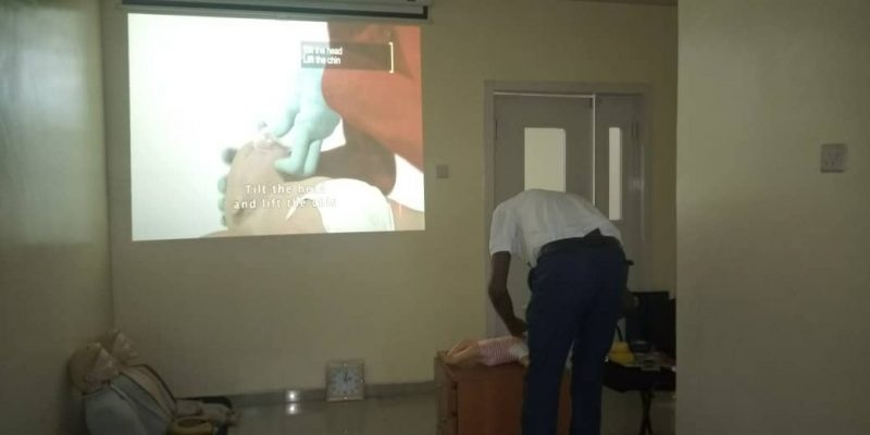HEI FIRST RESPONDERS PRACTICAL: Trainee applying face-mask on a baby