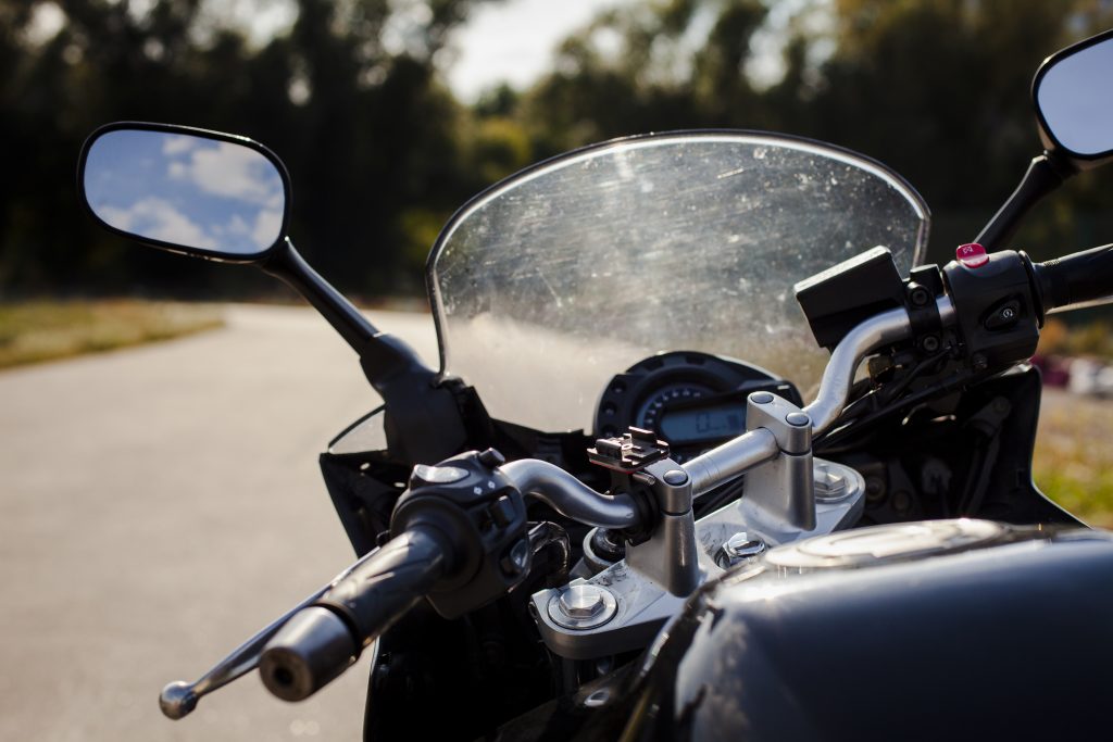 Close-up image of a motorcycle windshield